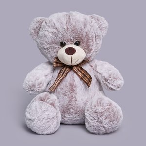 Серый плюшевый мишка