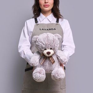 Серый плюшевый мишка